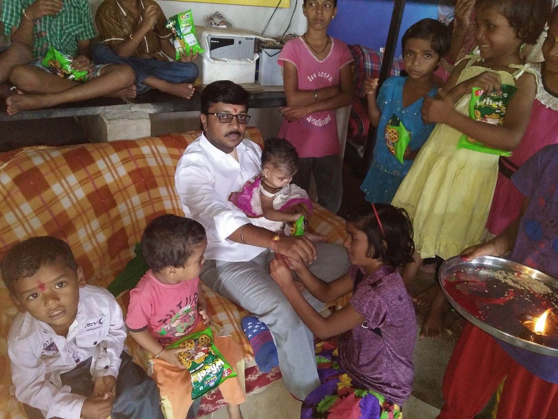 Founder Ganesh Dalvi with children at the ashram